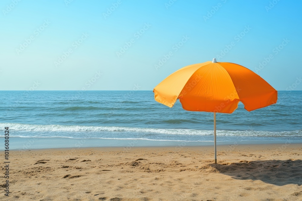 Vibrant orange beach umbrella on serene seashore Vibrant orange beach umbrella on serene seashore