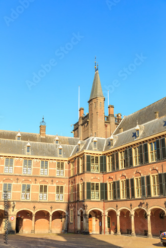 Netherlands, The Hague - July 1, 2019: Binnenhof - a complex of buildings in the center of The Hague, which houses the Dutch Parliament and the residence of the Prime Minister photo