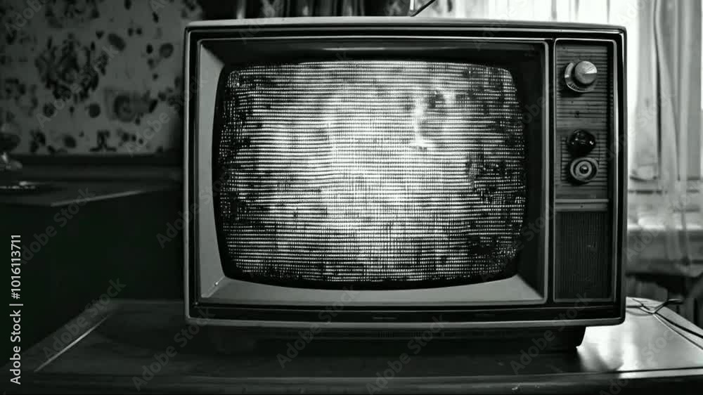 Old Retro TV - Static tv black and white noise caused by bad signal reception