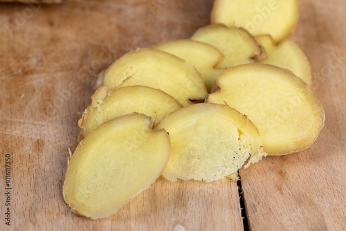 details of the ginger root used in cooking sliced into pieces