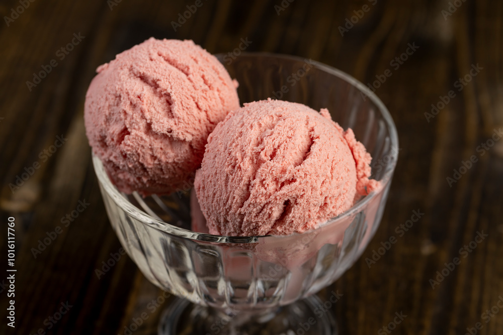 red strawberry-flavored ice cream in a glass bowl red strawberry-flavored ice cream in a glass bowl