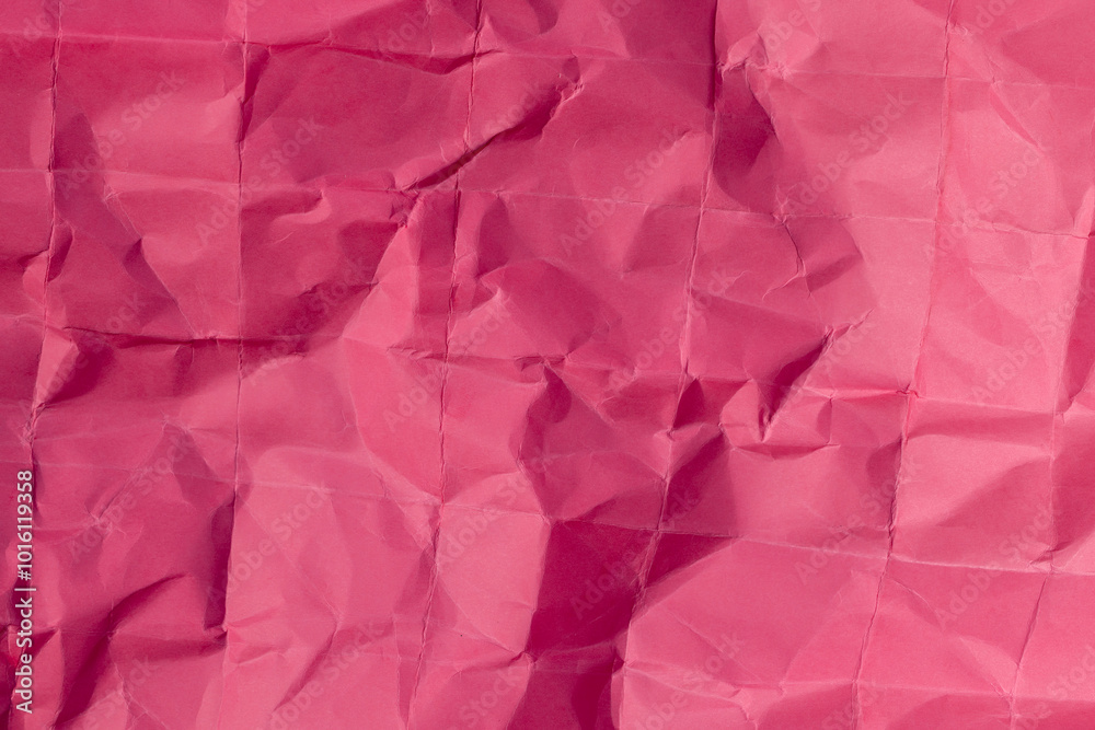 heavily crumpled red paper as background heavily crumpled red paper as background