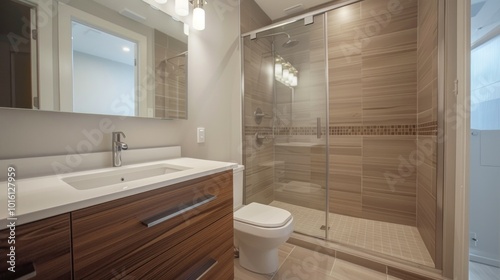 photograph of A compact city apartment bathroom with a space-saving shower, floating vanity, and large mirror to maximize light and space in a small area.