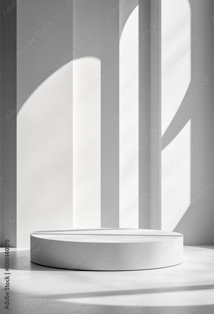 Fototapeta premium Minimalist white display platform in a bright, sunlit room with soft shadows.