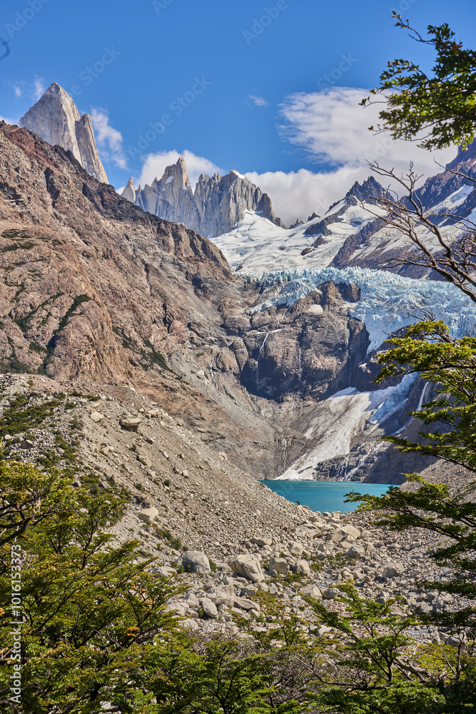 Fototapeta premium Glaciar Piedras Blancas and Laguna Piedras Blancas in Los Glaciares National Park, Patagonia, Argentina, where the glacier descends into the turquoise waters, framed by rugged peaks and forests.