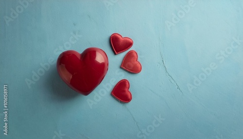 red heart melting on a blue pastel background. .Minimal concept of Valentine's Day
