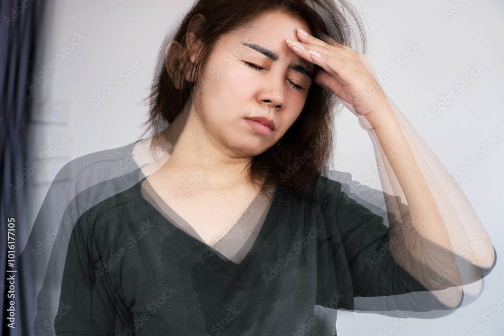 Asian woman suffering from Anemia feeling dizzy and vertigo , weakness and shortness of breath Asian woman suffering from Anemia feeling dizzy and vertigo , weakness and shortness of breath