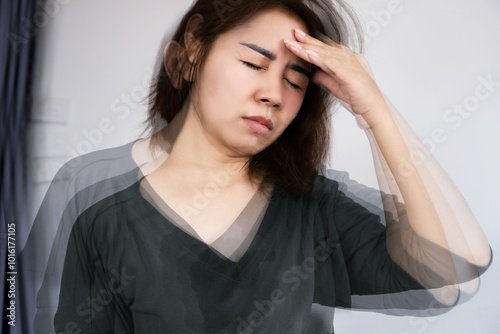 Asian woman suffering from Anemia feeling dizzy and vertigo , weakness and shortness of breath