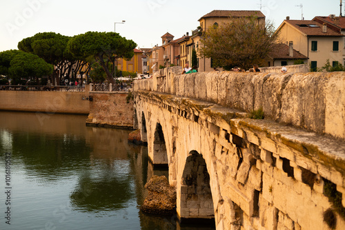 Discover the iconic Ponte di Tiberio, a Roman bridge spanning the River Marecchia in Rimini, Italy. Built in 20 AD, this majestic structure is a testament to Roman engineering and a must-see