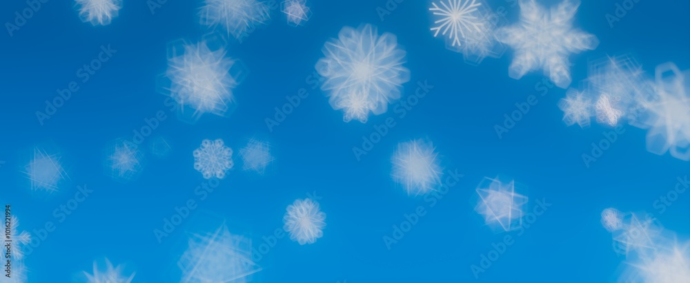 Snowflakes Falling on a Blue Sky Snowflakes Falling on a Blue Sky