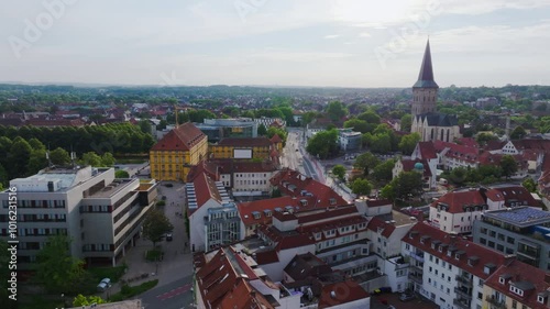 Wallpaper Mural Osnabruck, Germany showcasing the famous St. Mary's church from above. Buildings and streets are sprawling below as the camera slowly pans across the city Torontodigital.ca