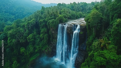 Waterfall Surrounded by Lush Greenery
