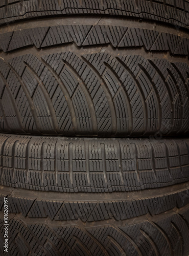 Old and new tyres in a pile tire