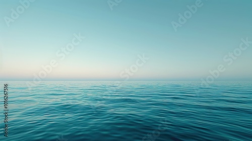 Calm Ocean Water with a Soft Blue Sky