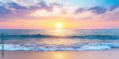 A breathtaking sunset over a tranquil ocean, painting the sky in hues of orange, pink, and purple with gentle waves lapping at the shore.