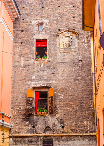 The windows in Prendiparte Tower, one of the tallest in Bologna, Italy photo