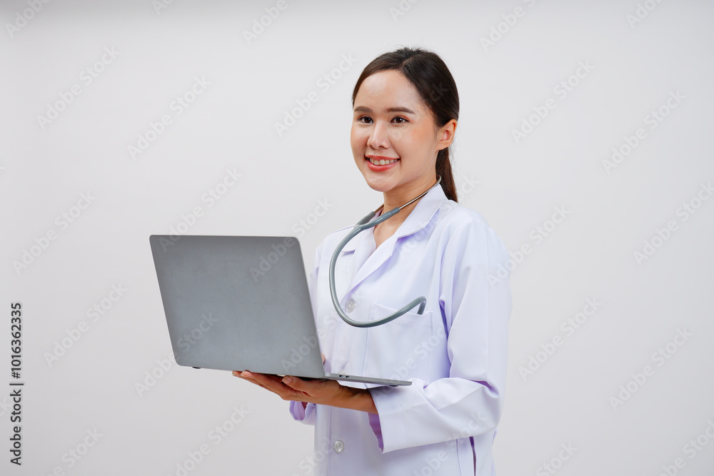 Asian female doctor standing smiling. Asian female doctor standing smiling.