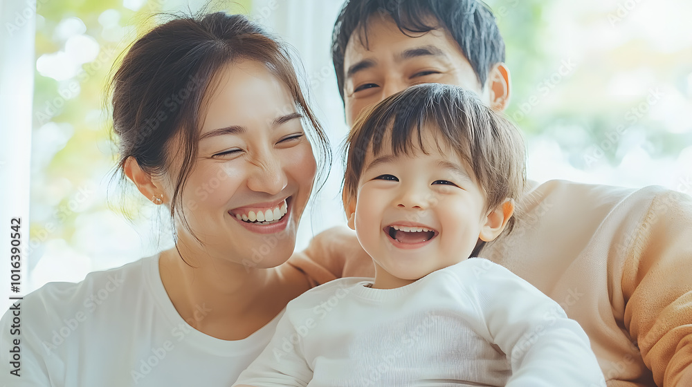 Peaceful Sunday morning in a cozy living room, Asian happy family gathers to share laughter and warmth. Soft sunlight filters to large windows, creating a serene and joyful atmosphere of togetherness. Peaceful Sunday morning in a cozy living room, Asian happy family gathers to share laughter and warmth. Soft sunlight filters to large windows, creating a serene and joyful atmosphere of togetherness.