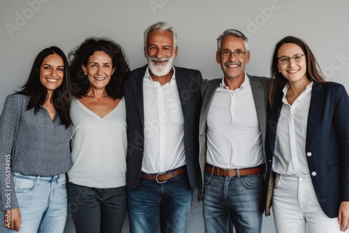 Group of diverse business people standing in a row and looking at camera