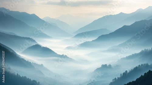 Misty Mountains Shrouded in Fog with a Valley Below