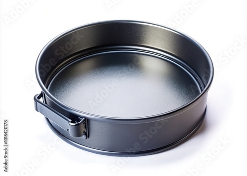 Shiny new black collapsible round stainless steel cake pan isolated on white background, perfect for baking cakes and cookies, with ample copyspace.