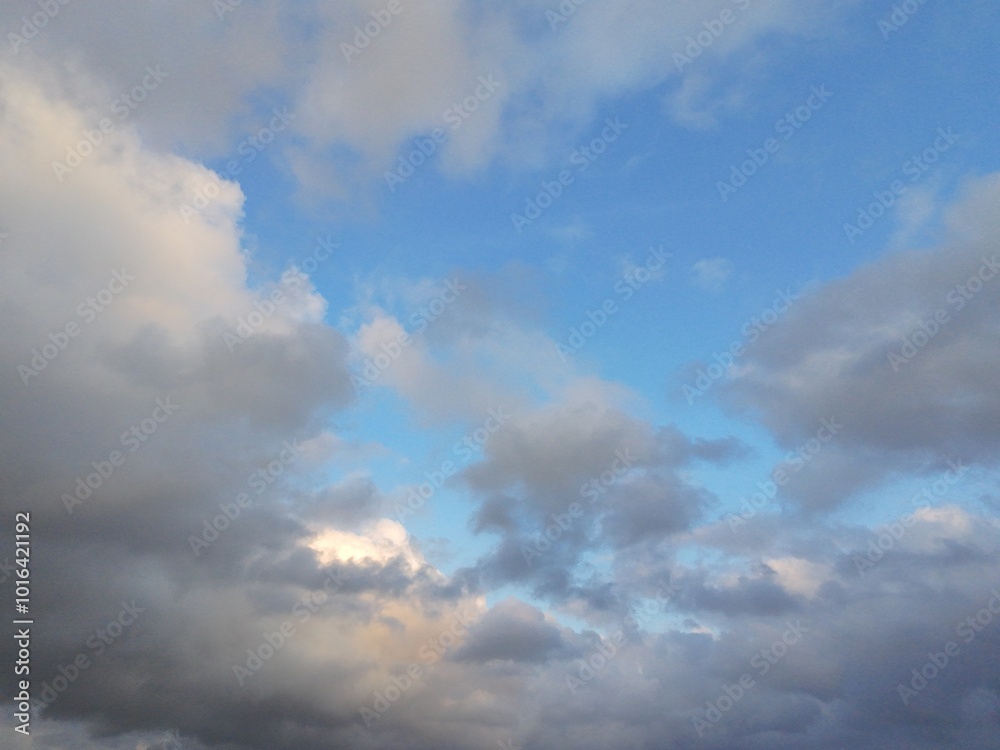 beautiful cloudy sky sunlight from the side, dramatic feel, it's going to rain beautiful cloudy sky sunlight from the side, dramatic feel, it's going to rain
