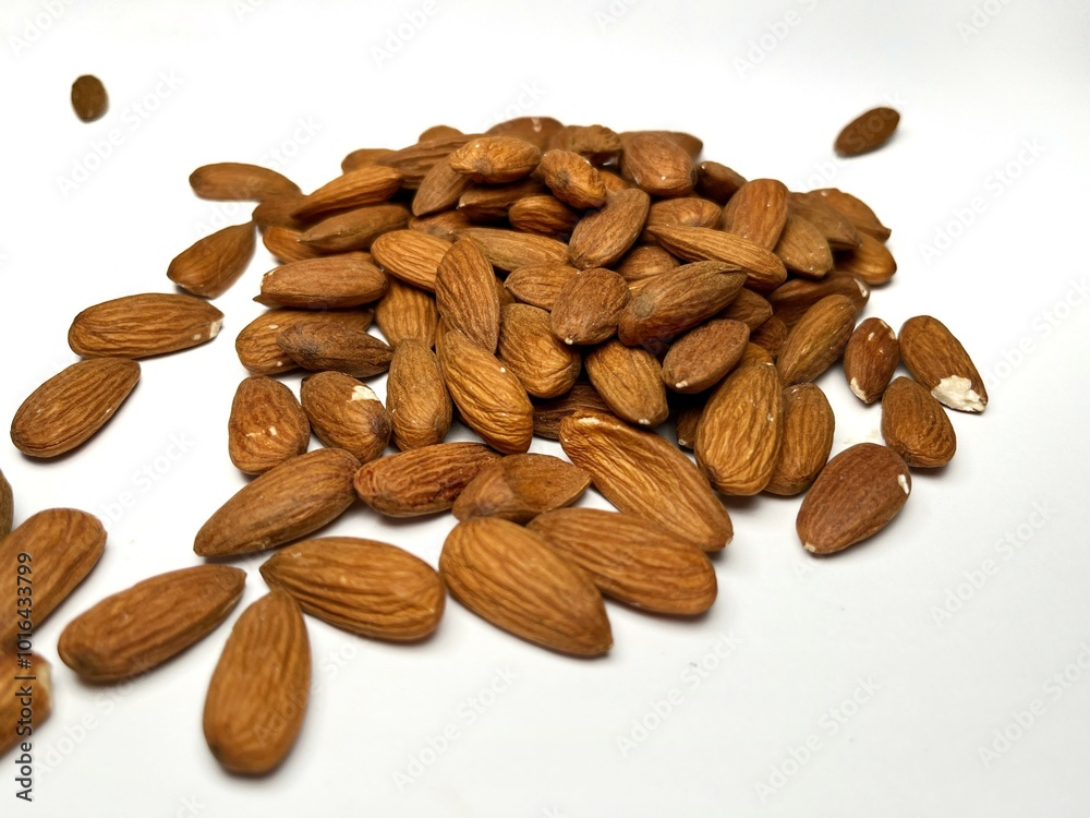 Roasted almond selected focused on white background Roasted almond selected focused on white background