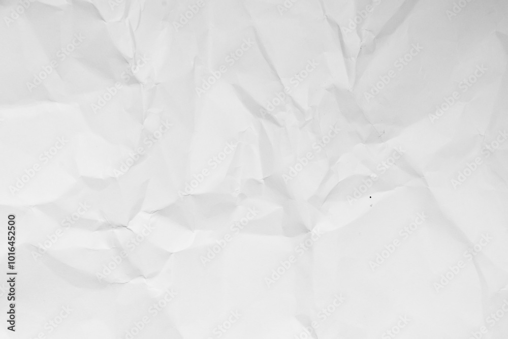 Grunge wrinkled white color paper textured background with copy space. Use for decoration or layer