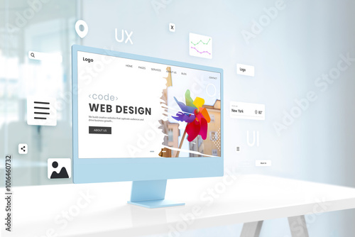 Stylish blue screen sits on an office desk, displaying a vibrant web design page, complemented by surrounding web design modules, reflecting a cutting-edge design studio atmosphere photo