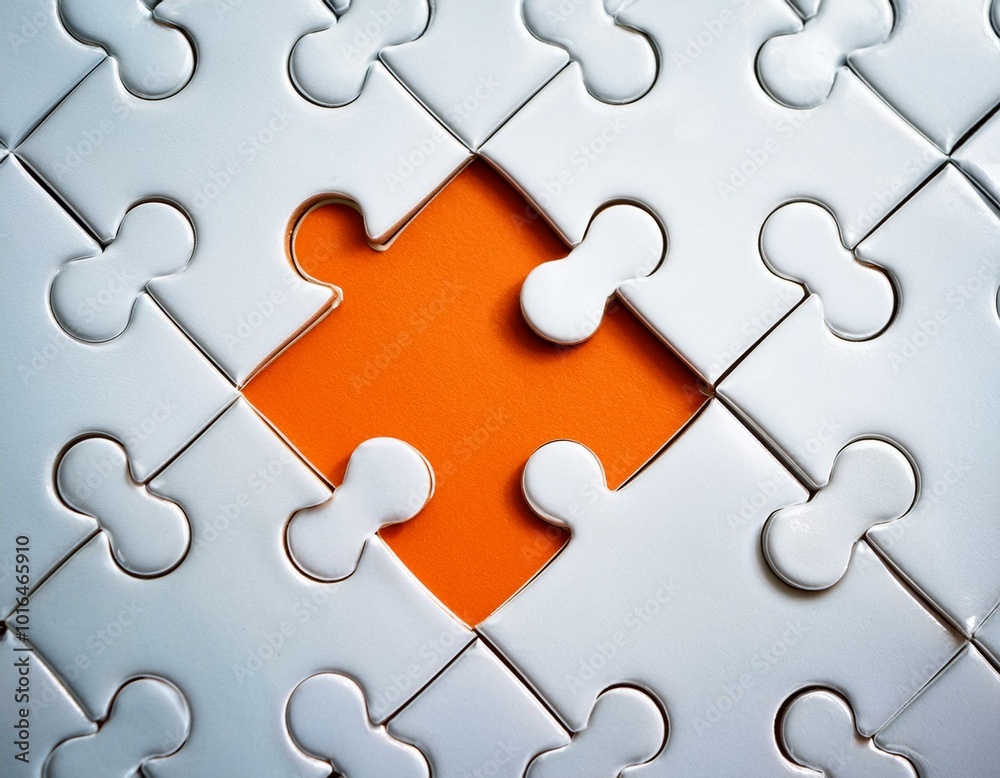 Picture of an orange puzzle piece that fits into a white puzzle. Teamwork, solutions, and problem-solving concepts are emphasized Picture of an orange puzzle piece that fits into a white puzzle. Teamwork, solutions, and problem-solving concepts are emphasized