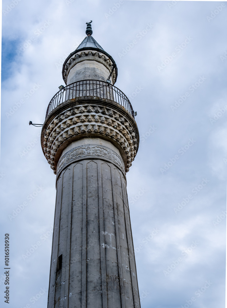 A view from below of the minaret against the sky. A view from below of the minaret against the sky.
