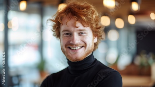 Portrait of a smiling businessman in casual office environment