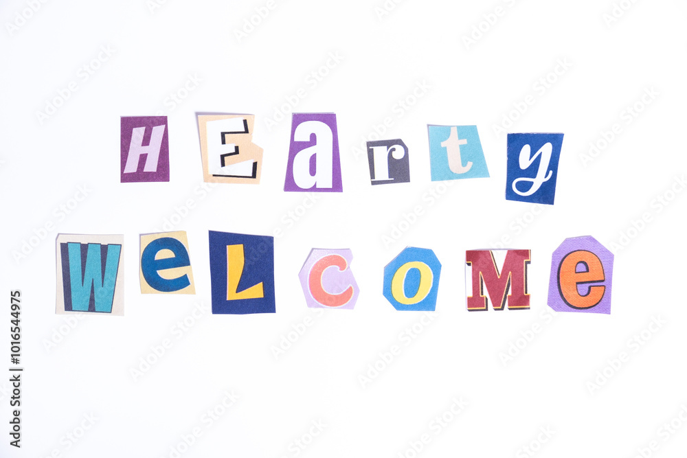 Welcome symbol. Concept words Hearty Welcome isolated on clean white background in fun cut out newspaper style typescript. Welcome symbol. Concept words Hearty Welcome isolated on clean white background in fun cut out newspaper style typescript.