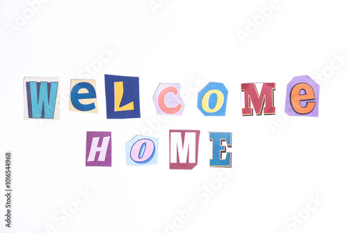 Welcome symbol. Concept words Welcome Home isolated on clean white background in fun cut out newspaper style typescript. 