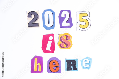 Phrase 2025 is Here spelled in cut out newspaper style typography isolated on white background.