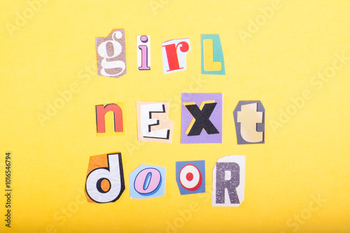 Phrase Girl Next Door spelled in cut out newspaper style typography, isolated on yellow background.
