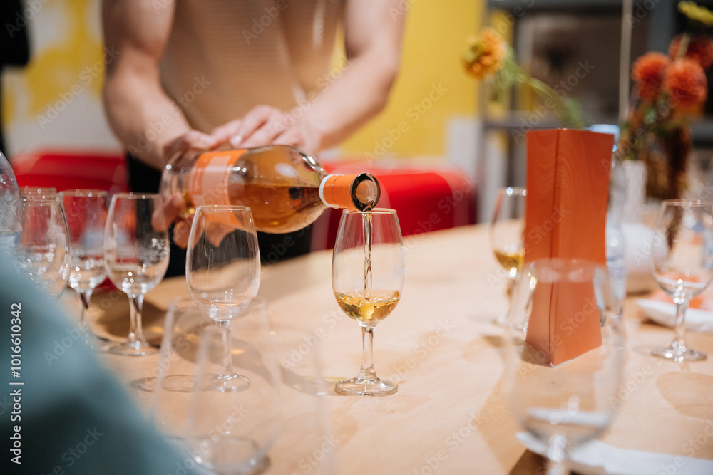 Pouring premium whiskey into glasses at a tasting event, Luxury, celebration, and social gatherings Pouring premium whiskey into glasses at a tasting event, Luxury, celebration, and social gatherings