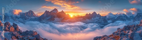 mountain range at sunrise with valleys filled with low-lying fog