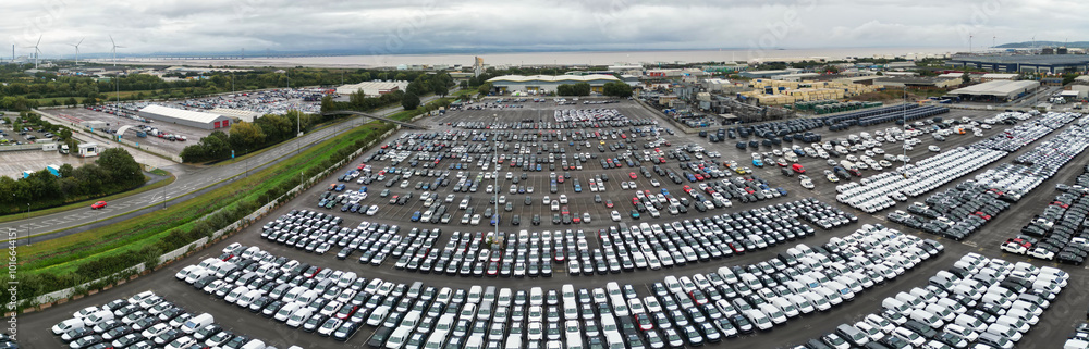 Fototapeta premium Aerial Ultra Panoramic View of Sea Port and Docks at Avonmouth Bristol City of England United Kingdom During Cloudy Day of August 24th, 2024