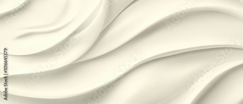 Abstract white fabric texture with gentle waves, perfect for backgrounds and design elements.