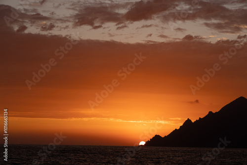 Corsican sunset, behind the headland