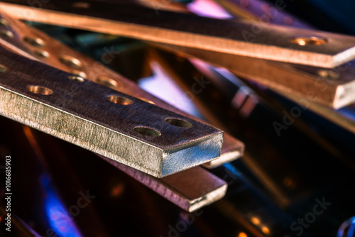 Copper flat busbars close-up, product of the non-ferrous metals industry photo