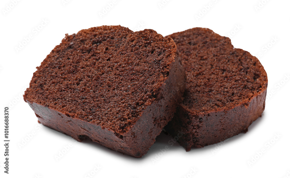 Slices of delicious chocolate sponge cake isolated on white Slices of delicious chocolate sponge cake isolated on white