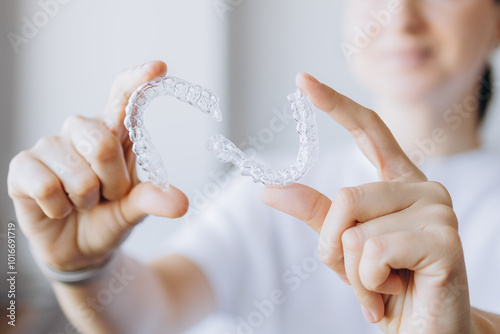 Dentist Is Holding Invisalign Braces Or Invisible Aligners For Dental Correction In Her Hands
