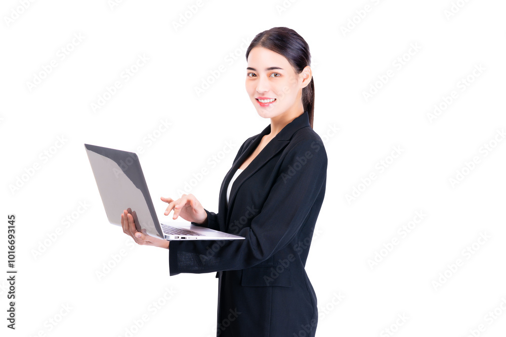 Professional young business woman in a black suit confidently holding and working on a laptop, symbolizing modern business, technology, and corporate professionalism. Professional young business woman in a black suit confidently holding and working on a laptop, symbolizing modern business, technology, and corporate professionalism.