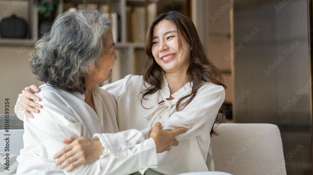 Portrait of enjoy happy love asian family senior mature mother and young daughter smiling play laughing and having fun together at home, care, elderly, insurance.happy family and Mother Day concept Portrait of enjoy happy love asian family senior mature mother and young daughter smiling play laughing and having fun together at home, care, elderly, insurance.happy family and Mother Day concept