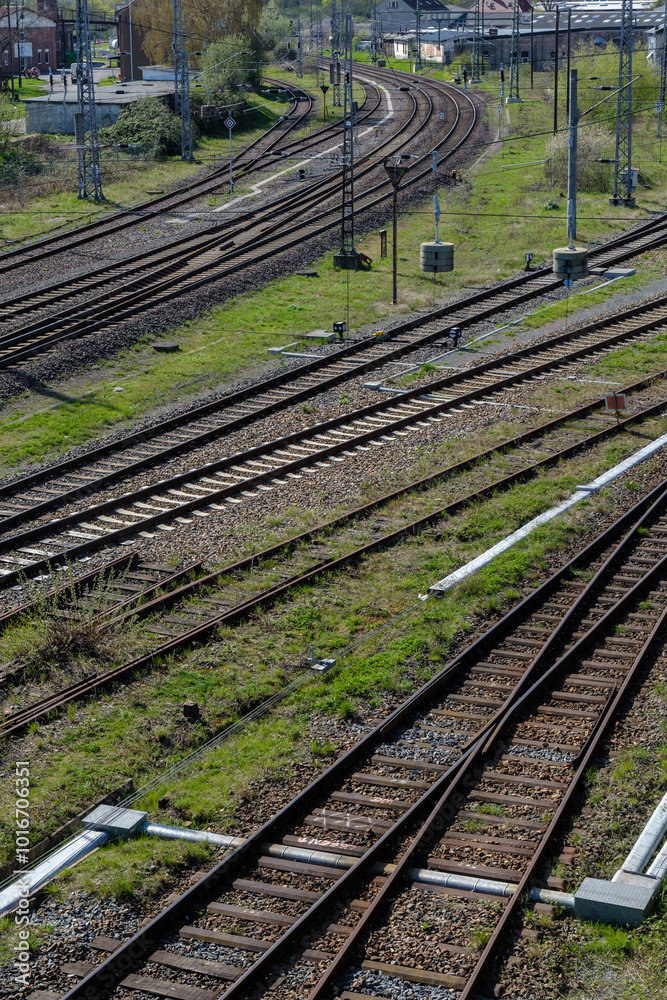 Railway outdoors on beautiful summer day. Industrial landscape with rails and railway.