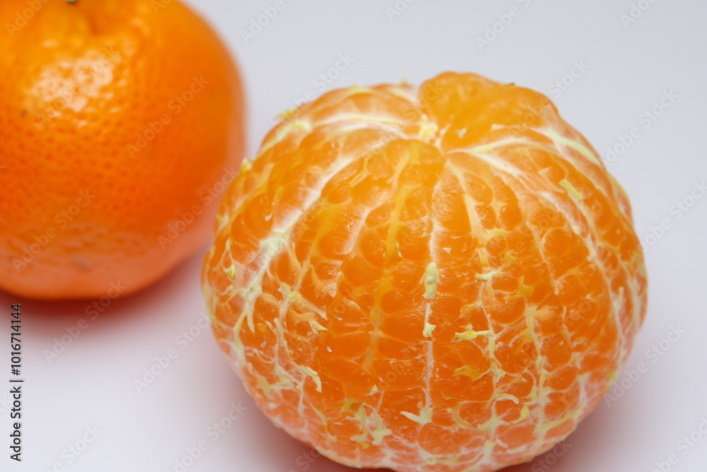 Tangerines and oranges in a gray. Healthy tangerine food concept. A green with oranges, tangerines and other fruits. A green with oranges, tangerines lifestyle and other fruits. Tangerines and oranges in a gray. Healthy tangerine food concept. A green with oranges, tangerines and other fruits. A green with oranges, tangerines lifestyle and other fruits.