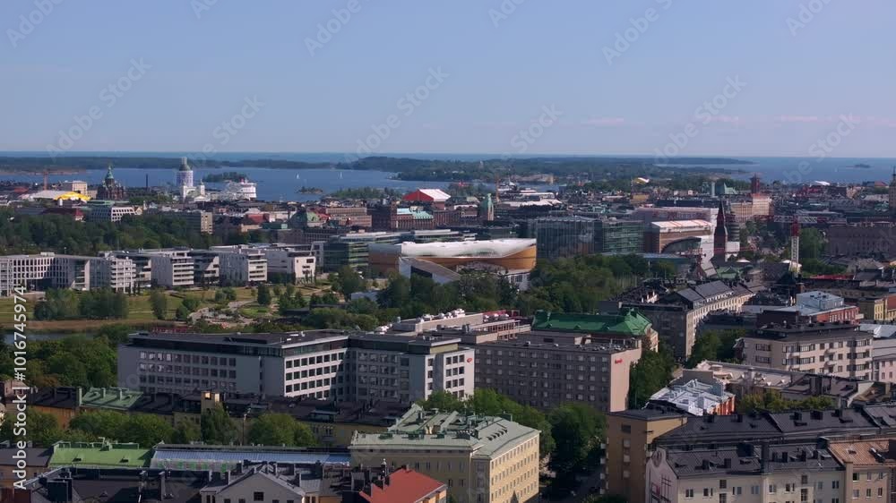 Helsinki, Finland, vibrant city with a blend of nature and urban life. This aerial view captures the essence of the city and Central Library Oodi Helsinki, Finland, vibrant city with a blend of nature and urban life. This aerial view captures the essence of the city and Central Library Oodi