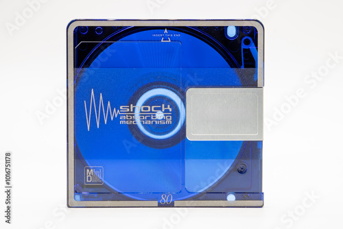 Close-up of a blue minidisc record isolated on white background